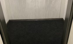 767 5th Ave GM Building passenger elevator carpeting